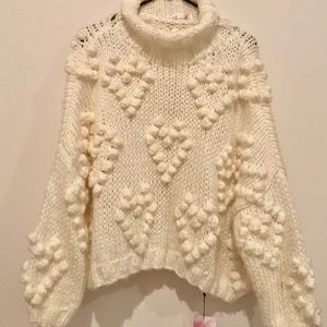 Chunky white sweater with hearts